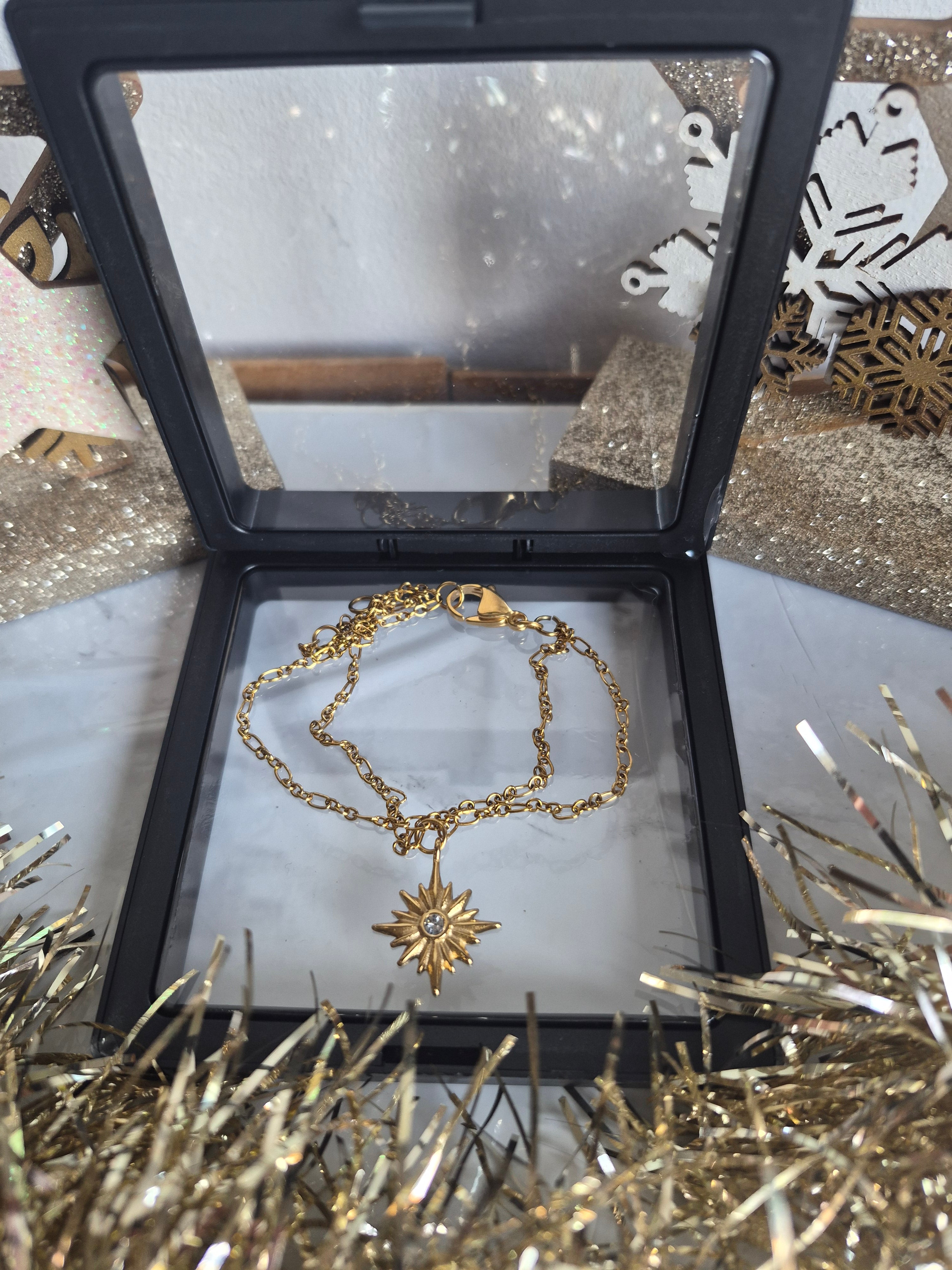 Bracelet Double Chaîne Dorée avec Étoile du Nord Zircon