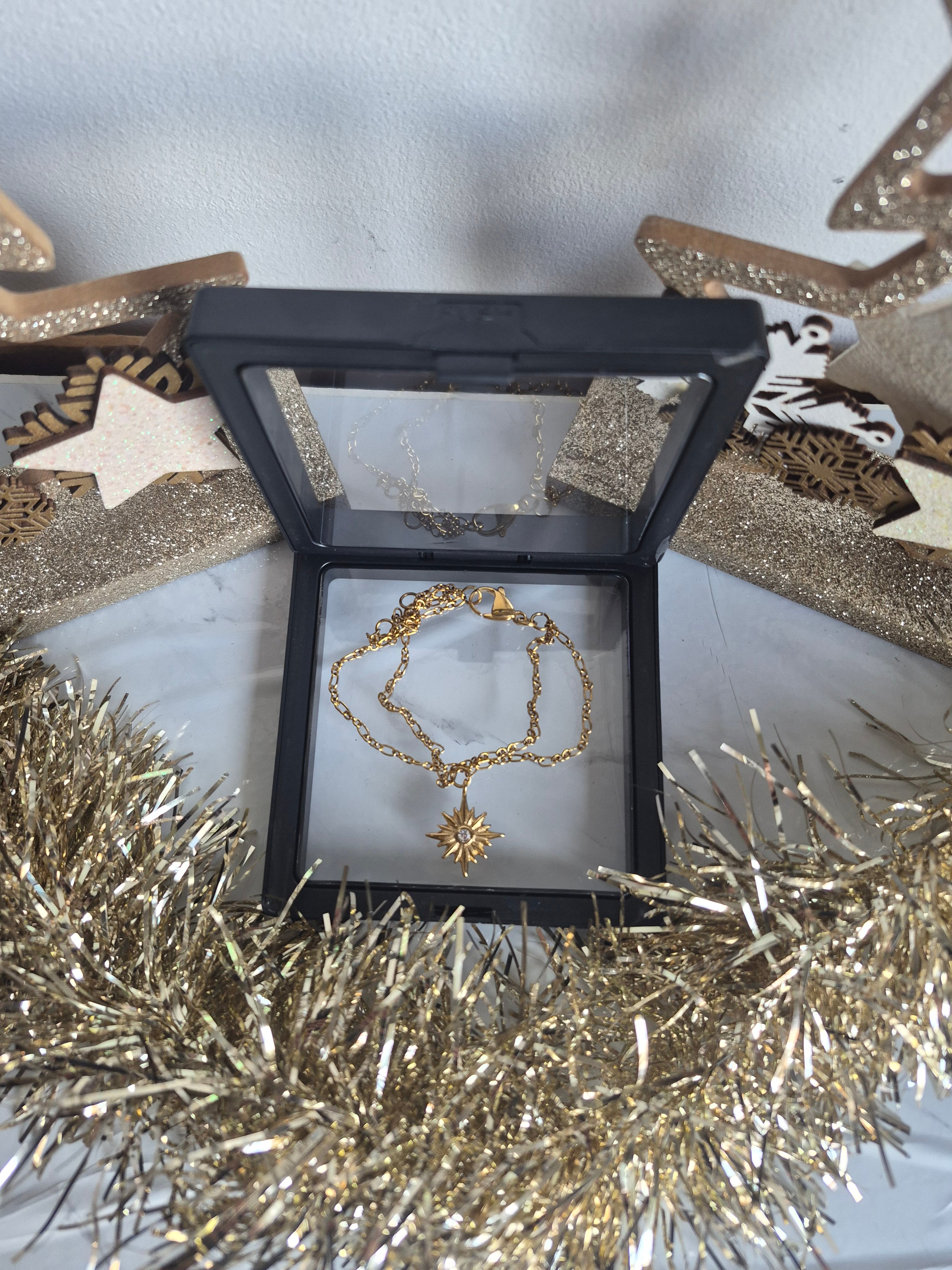 Bracelet Double Chaîne Dorée avec Étoile du Nord Zircon